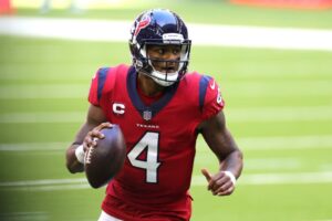 HOUSTON, TEXAS - DECEMBER 06: Deshaun Watson #4 of the Houston Texans scrambles with the ball against the Indianapolis Colts during the first half at NRG Stadium on December 06, 2020 in Houston, Texas. (Photo by Carmen Mandato/Getty Images)